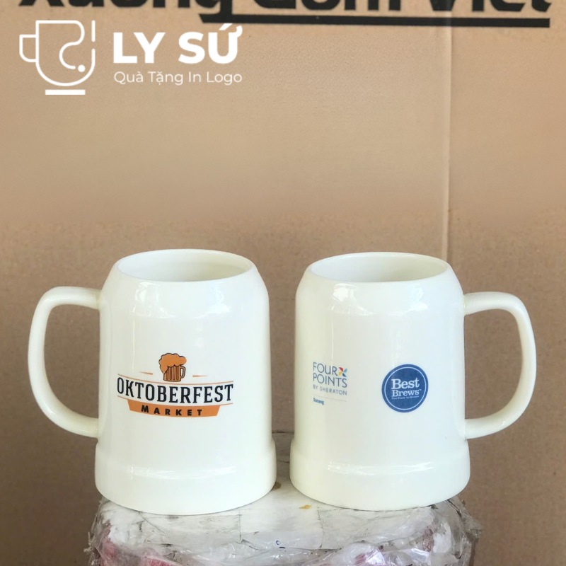Ca bia Bát Tràng quà tặng in logo màu trắng dáng trụ quai C 500ml CB-05