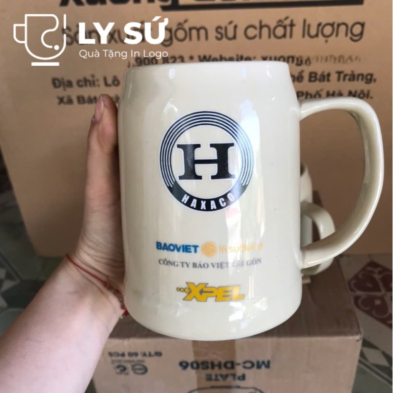 Ca bia Bát Tràng quà tặng in logo màu trắng ngà dáng trụ quai C 500ml CB-02